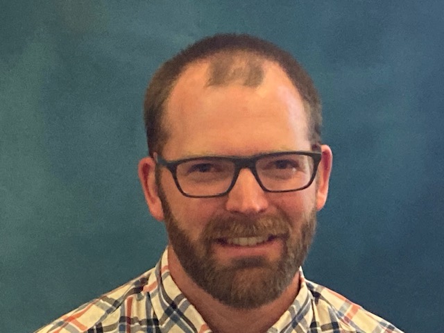 this is a photo of blake poynor, who is a teacher at sisters middle school